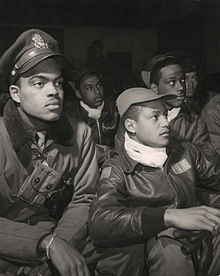 Men of the 332nd Fighter Tuskegee Airmen. Members of the group attend a briefing in Italy in 1945.